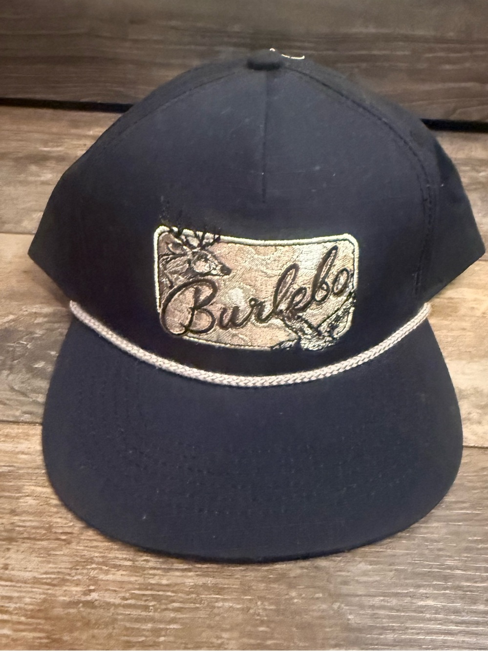 BURLEBO Black Cap with Gold Embroidered Patch and Rope Trim